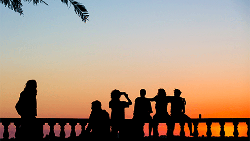 students enjoying the sunset