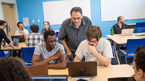 professor and students in a classroom